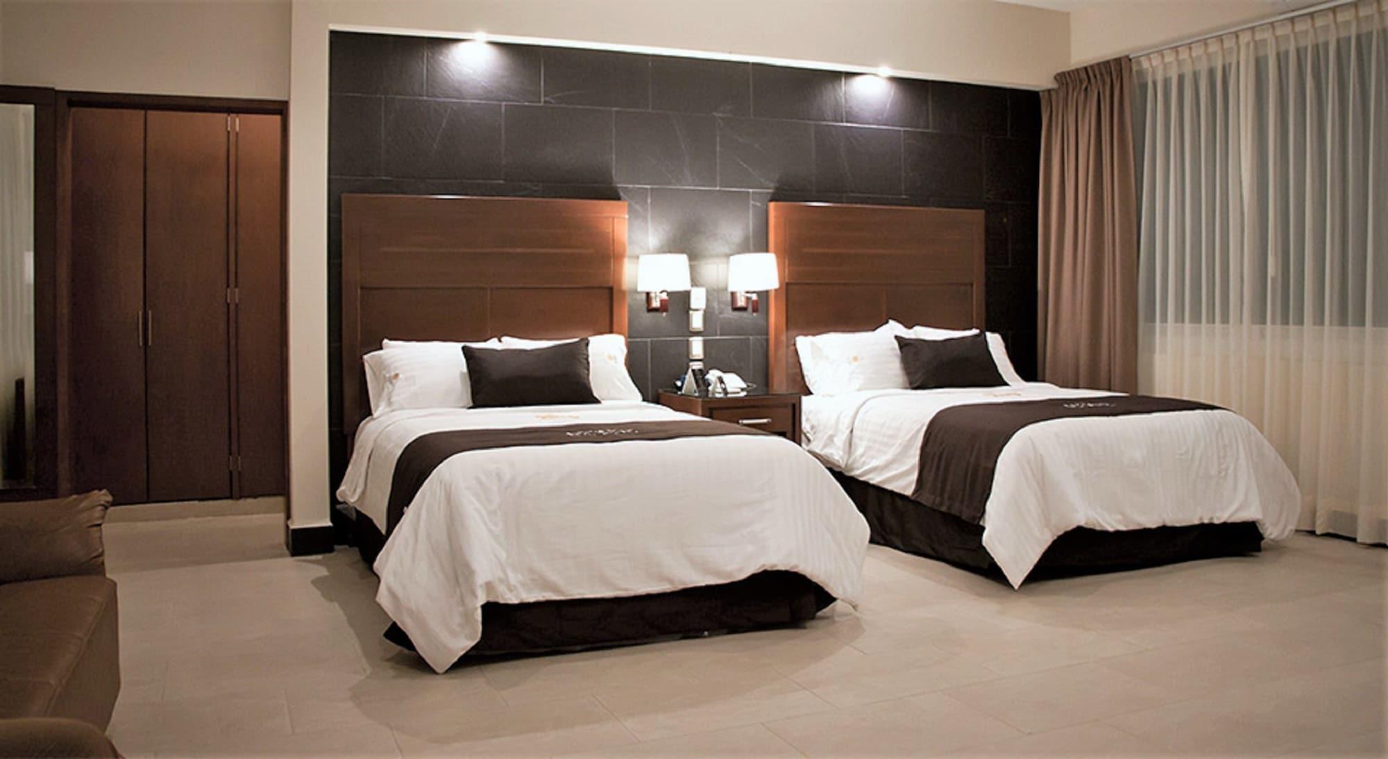 Hotel Ecce Inn & Spa Silao Exterior photo A typical hotel room