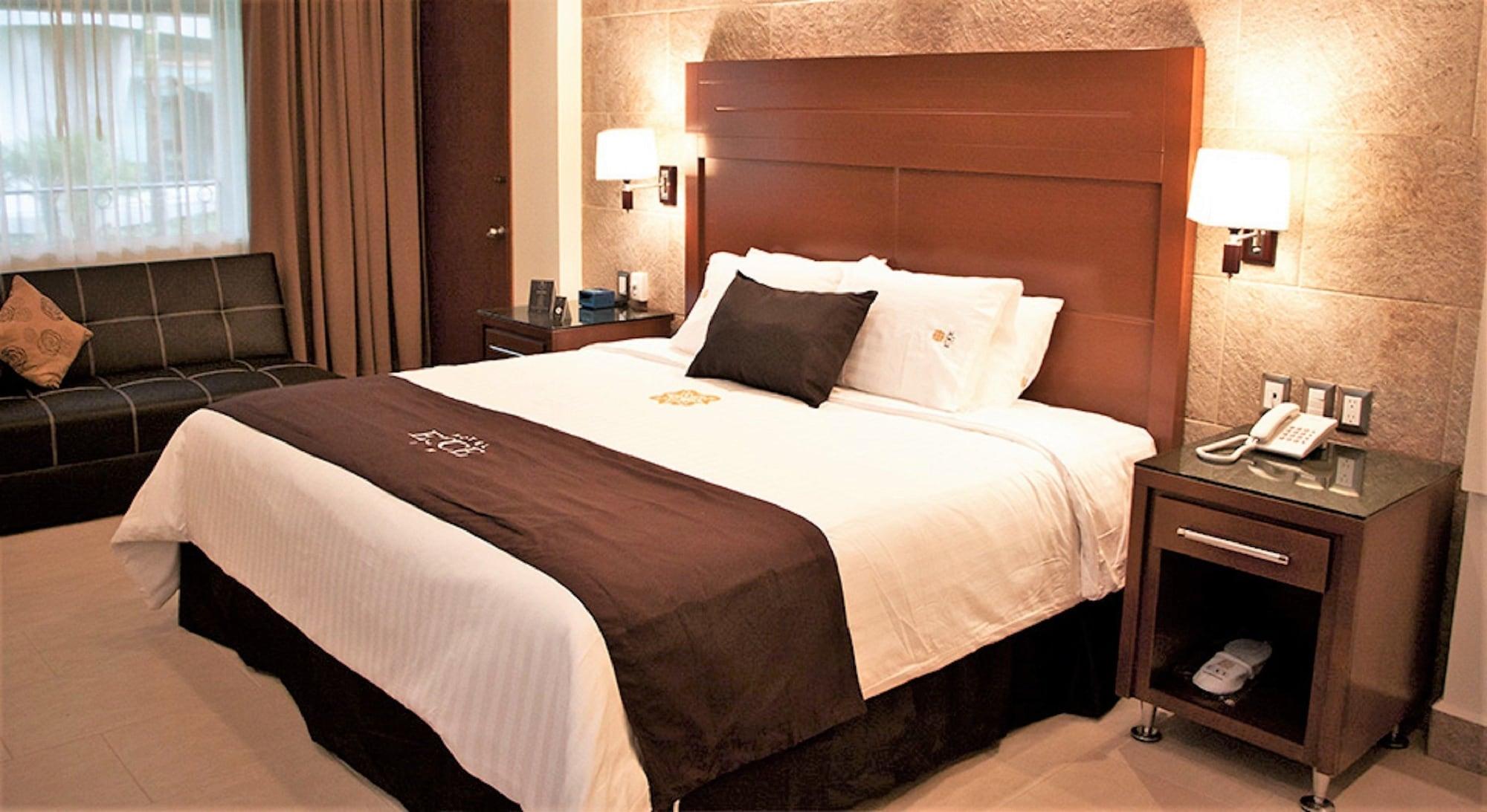 Hotel Ecce Inn & Spa Silao Exterior photo A bed