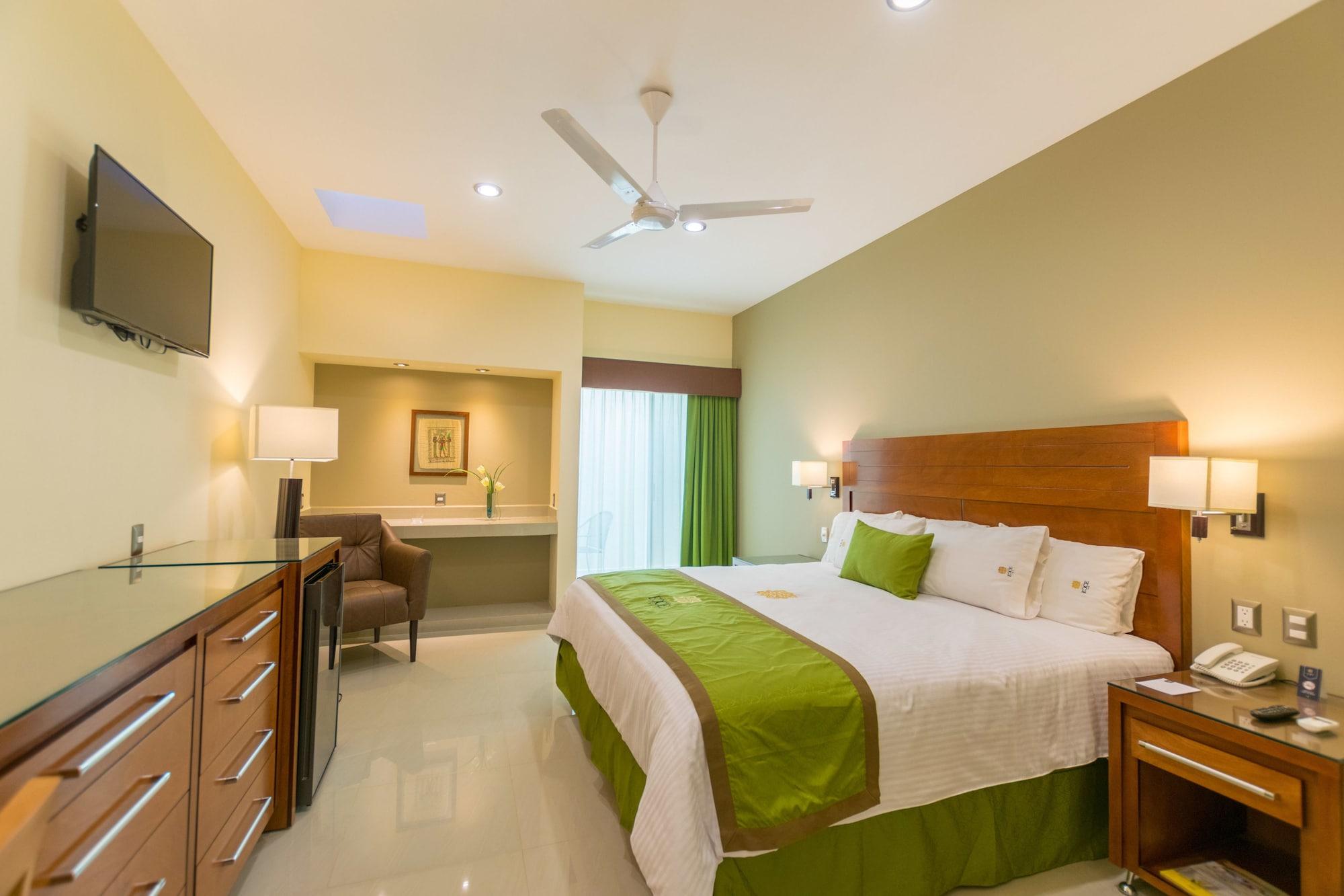 Hotel Ecce Inn & Spa Silao Exterior photo A bedroom at the hotel