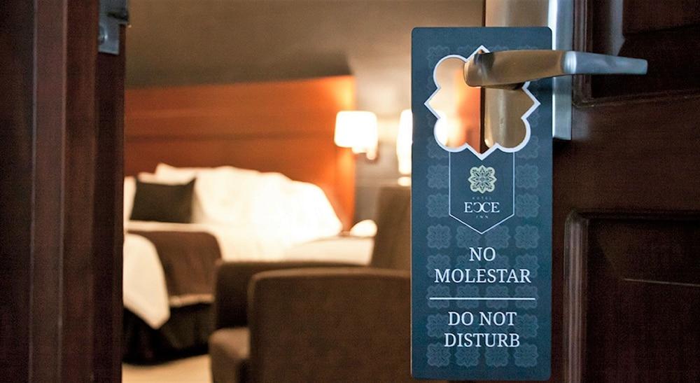 Hotel Ecce Inn & Spa Silao Exterior photo A door sign