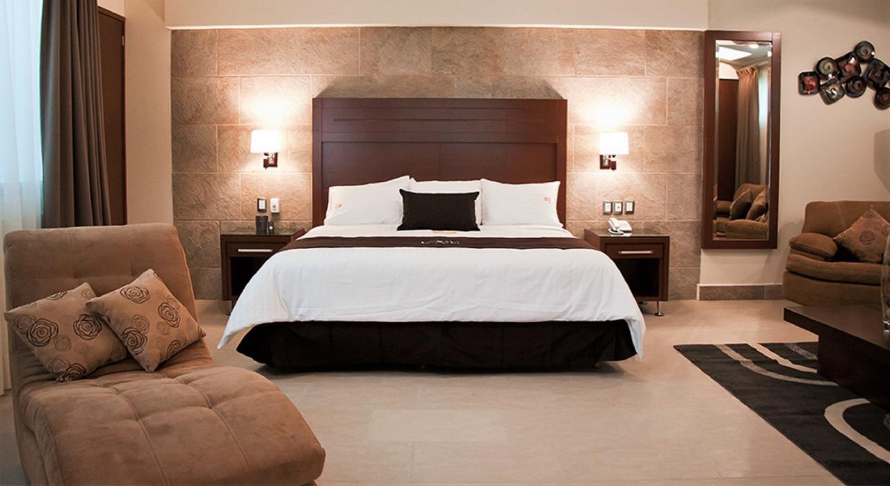 Hotel Ecce Inn & Spa Silao Exterior photo A bedroom at the hotel